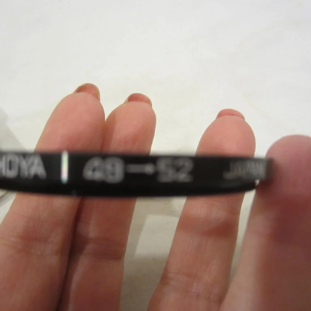 HOYA step up filter 49mm-52mm & plastic filter cases
